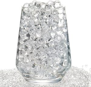 Bolinhas transparentes que crescem na água para decoração vasos plantas 24g